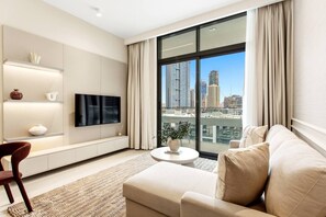TV - Cozy 1Bedroom w/ Rooftop Pool & Sauna in JVC (Dubai)
