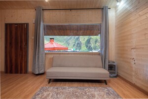 Habitación superior, vistas a la montaña | Zona de estar