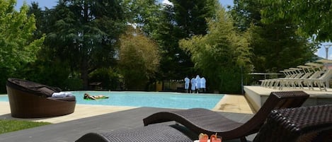 Indoor pool, outdoor pool, open 9:00 AM to 8:00 PM, pool loungers