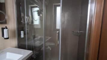 Shower, free toiletries, hair dryer, towels