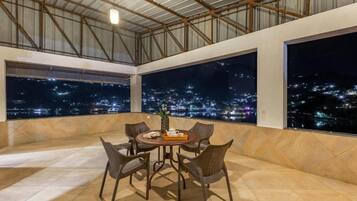 Deluxe Villa, Balcony, City View | Outdoor dining