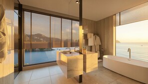 Ein modernes Badezimmer mit großem Fenster, einer Badewanne und einem Waschtisch mit zwei Becken.