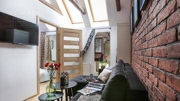 Apartment, 1 Doppelbett, Klimaanlage | Wohnbereich