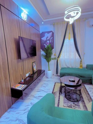 Deluxe Apartment, Balcony, City View | Living area - Timstars Serviced Apartment (Umuahia)