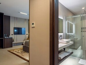 Executive Apartment, Balcony, Pool View | Desk, laptop workspace, free WiFi