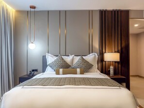 Executive Apartment, Balcony, Pool View | Desk, laptop workspace, free WiFi
