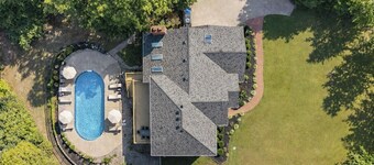 NEW! Triple Crown Manor: Pool, Hot Tub, Game Room, Fire Pit, Sleeps 20