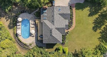 NEW! Triple Crown Manor: Pool, Hot Tub, Game Room, Fire Pit, Sleeps 20