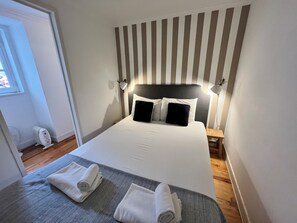 Blackout drapes, iron/ironing board, free WiFi, bed sheets