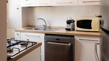 Apartment (1 Bedroom) | Private kitchen | Microwave, stovetop, espresso maker, electric kettle