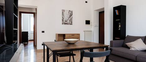 Apartment (1 Bedroom) | Living area | 32-inch Smart TV with cable channels
