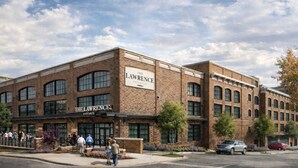 A brick building with large windows and a sign reading 'The Lawrence Entrance.' - The Lawrence Hotel Lawrenceville, Tapestry Collection Hilton (Lawrenceville)