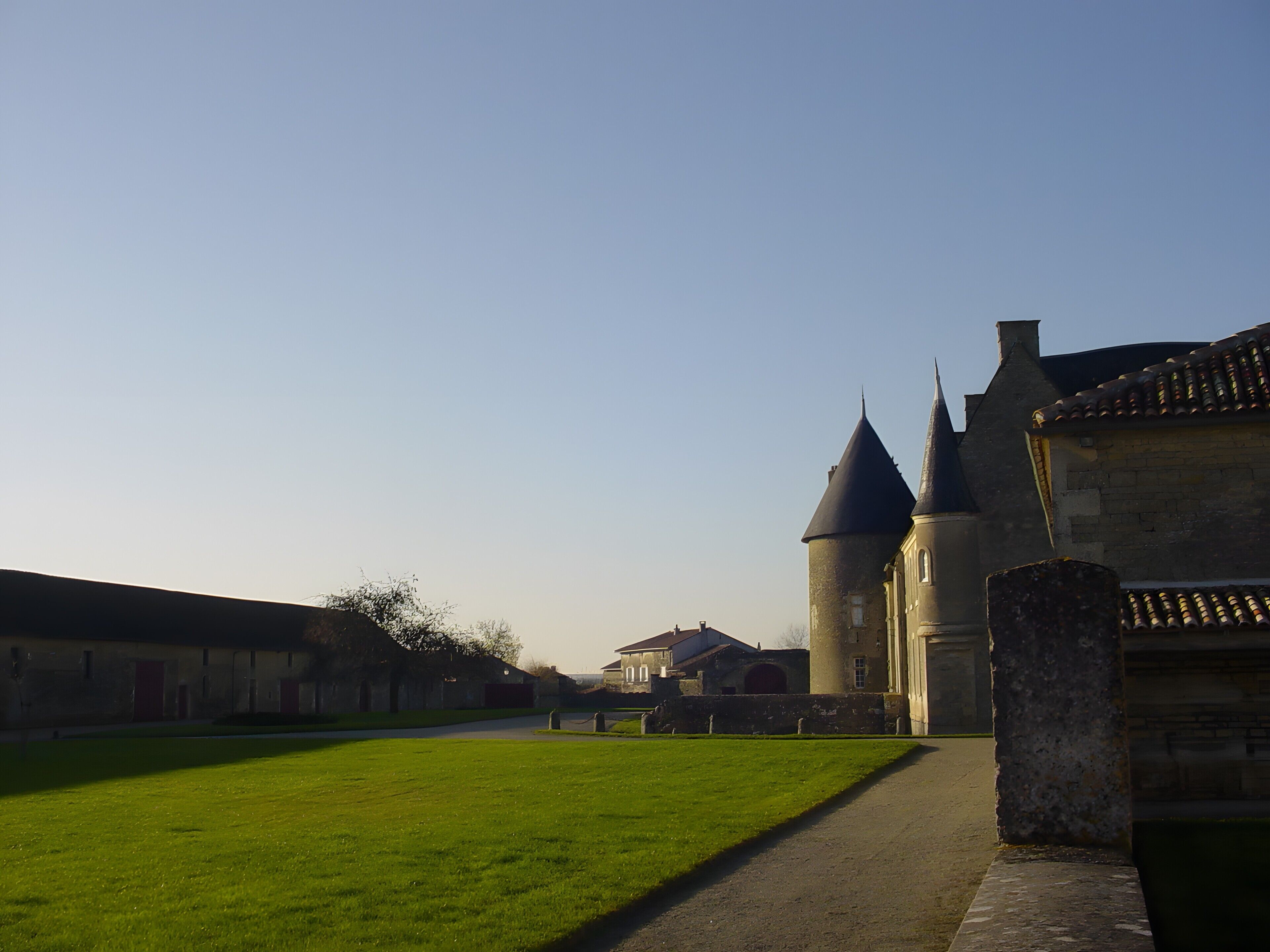A castle with a central tower and a surrounding courtyard.