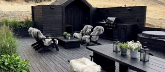 Waterfall Villa – Black Beach & Fjord Views