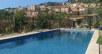 F4 level villa with pool in kabylie bouzueguen facing the mountain.