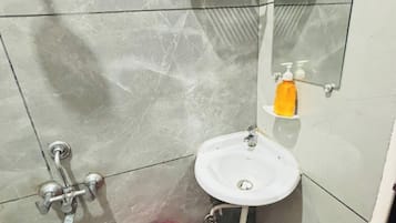 Deluxe Double Room, Balcony, City View | Bathroom | Slippers