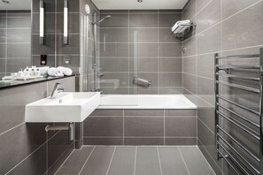 Combined shower/tub, hair dryer, towels, soap