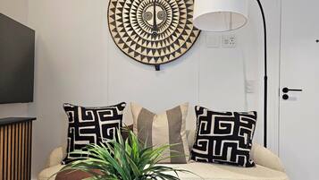 Studio | Living area | 50-inch TV with digital channels