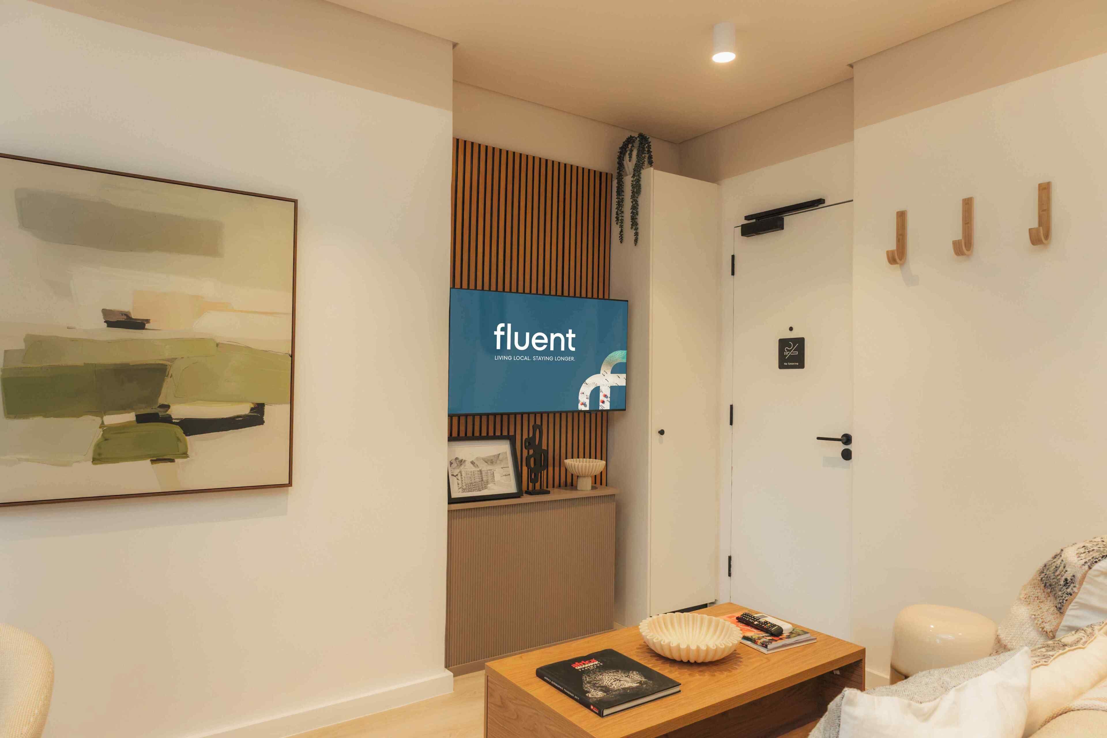 Luxury Apartment | Living area | 50-inch TV with digital channels