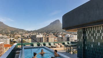 Outdoor pool, pool umbrellas, sun loungers