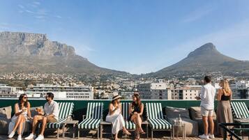 Outdoor pool, pool umbrellas, sun loungers