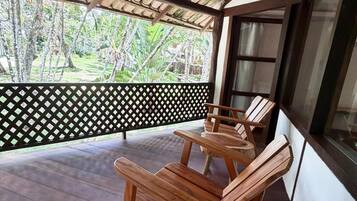Deluxe Quadruple Room, Garden View | Terrace/patio