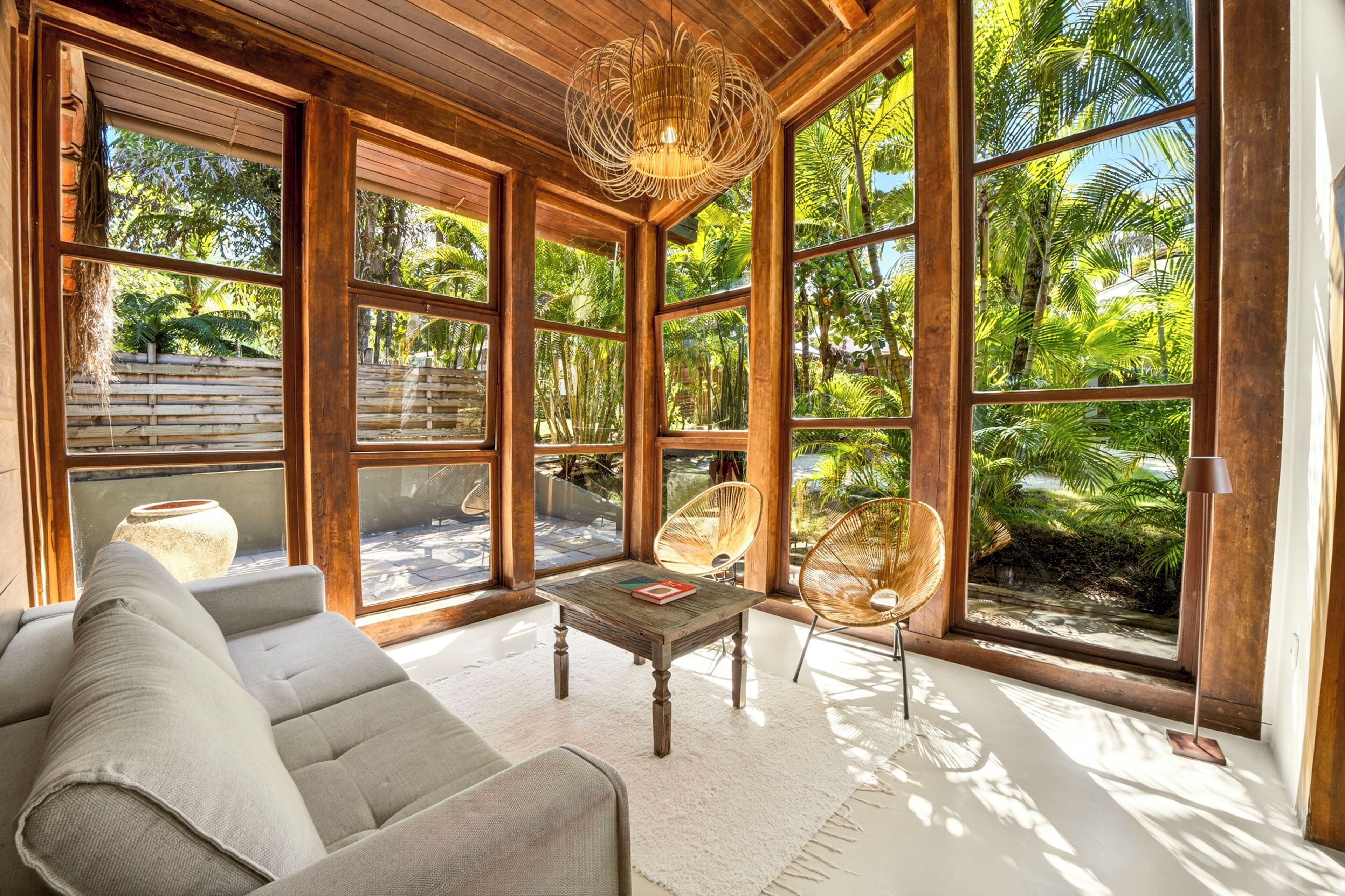 Deluxe Quadruple Room, Lanai, Garden View | Living area