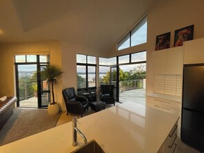 Living area - Villa Snellstopia | Funky beach retreat with sea views, BBQ and great vibes (Snells Beach)