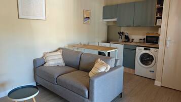 Casa conforto, vista para o jardim | Área de estar