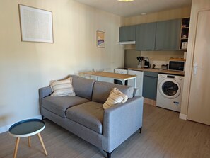 Maison Confort, vue jardin | Coin séjour