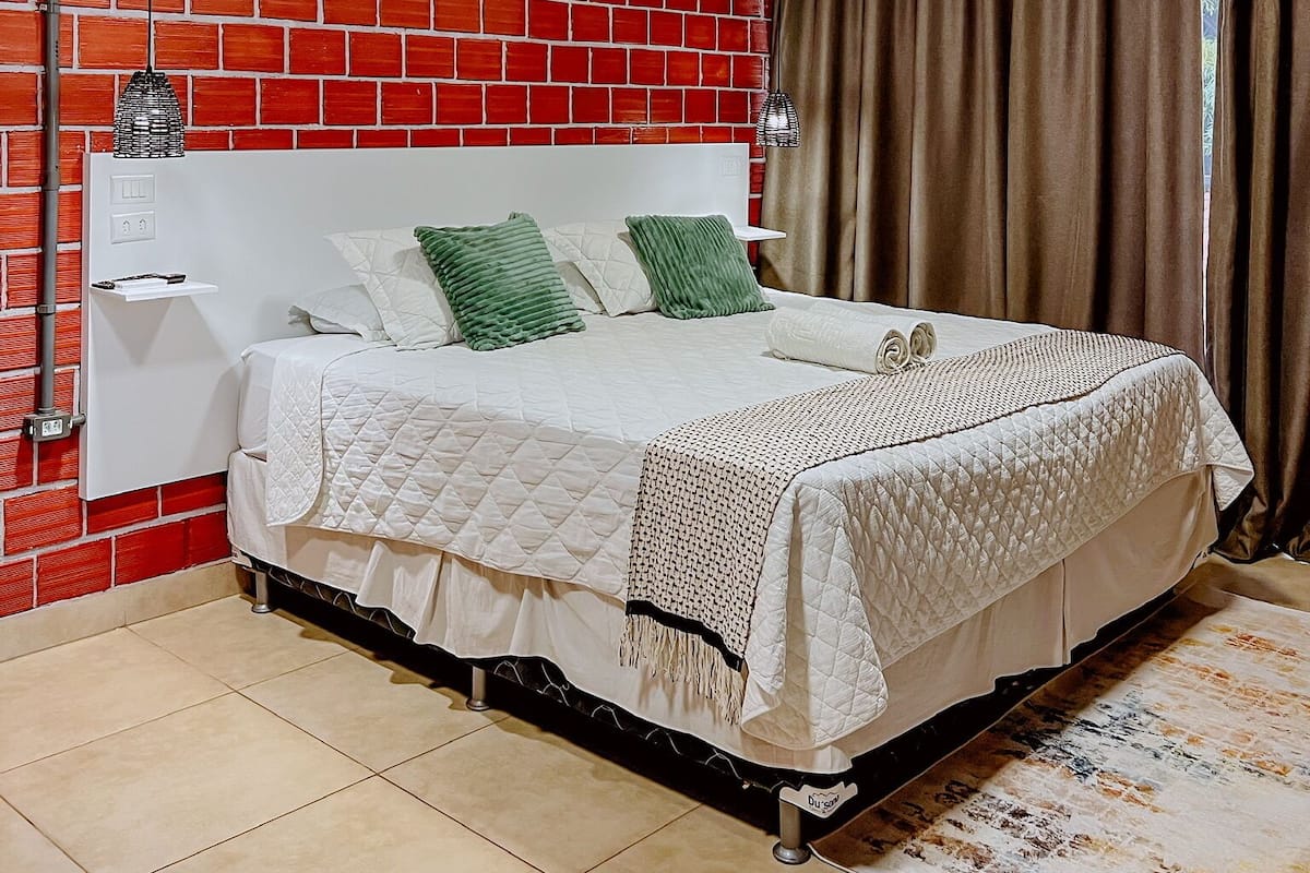 Deluxe Double Room, Balcony, City View | Free WiFi, bed sheets