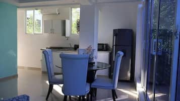 Fridge, oven, coffee/tea maker, cookware/dishes/utensils