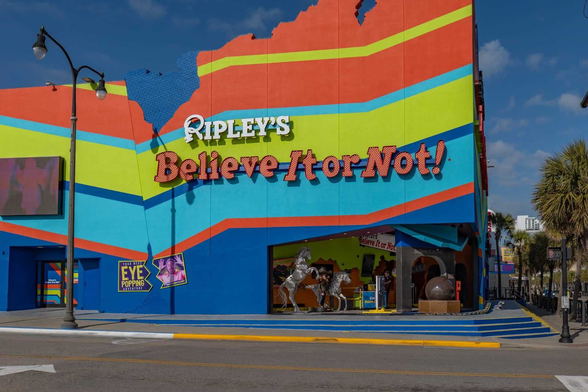 A colorful building with a sign that reads 'Ripley's Believe It or Not!'.