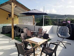 Outdoor dining - Apt. Family house, beach and mountain view, 2 Bedrooms, 1 Bathroom, Rooftop, AC, BBQ, WiFi (Barahona)