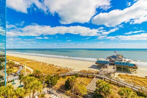 A beachside hotel with a pier, a boardwalk, and a view of the ocean. - Yachtsman S803B Studio (Myrtle Beach)