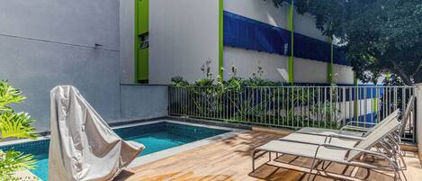 Outdoor pool, pool umbrellas, pool loungers