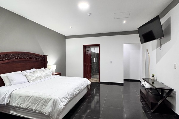 Deluxe Suite, Balcony, City View | Iron/ironing board, free WiFi, bed sheets