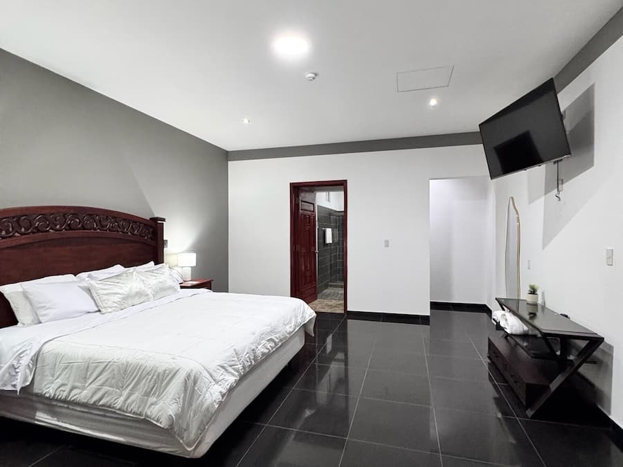 Deluxe Suite, Balcony, City View | Iron/ironing board, free WiFi, bed sheets