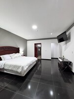 Deluxe Suite, Balcony, City View | Iron/ironing board, free WiFi, bed sheets