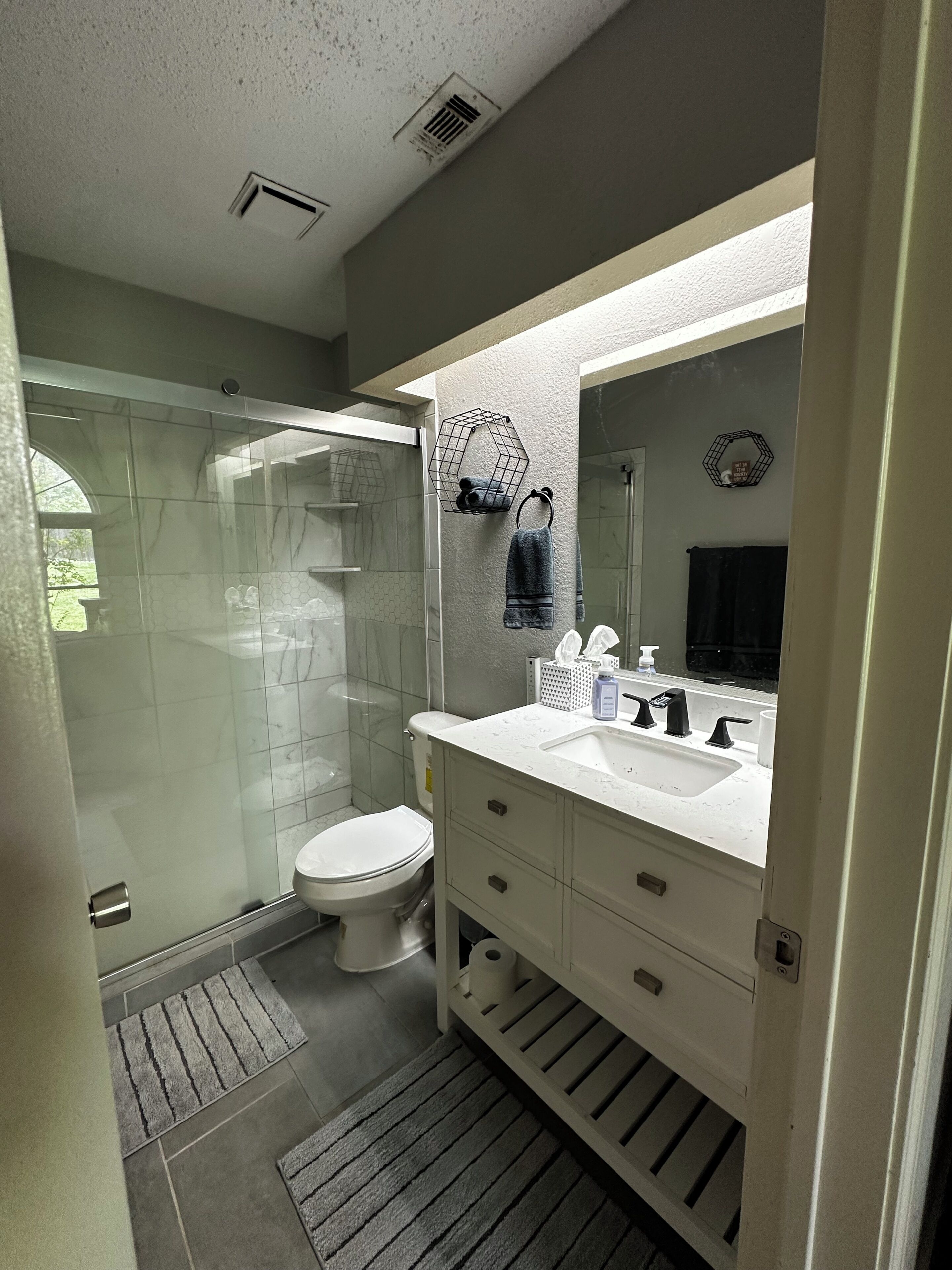 Shower, towels, toilet paper