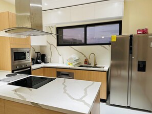 Fridge, microwave, oven, stovetop
