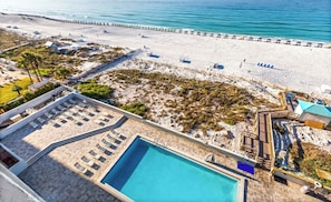 A resort with a swimming pool, beach access, and a view of the ocean. - SunDestin Resort Unit 1515 (Destin)