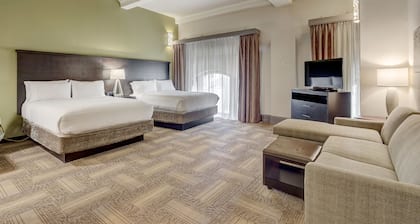 2 Queen Studio w/ City View | Free Breakfast + Gym