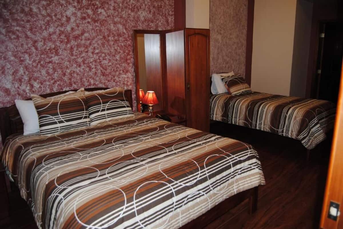 Habitación triple estándar, patio, vista al patio