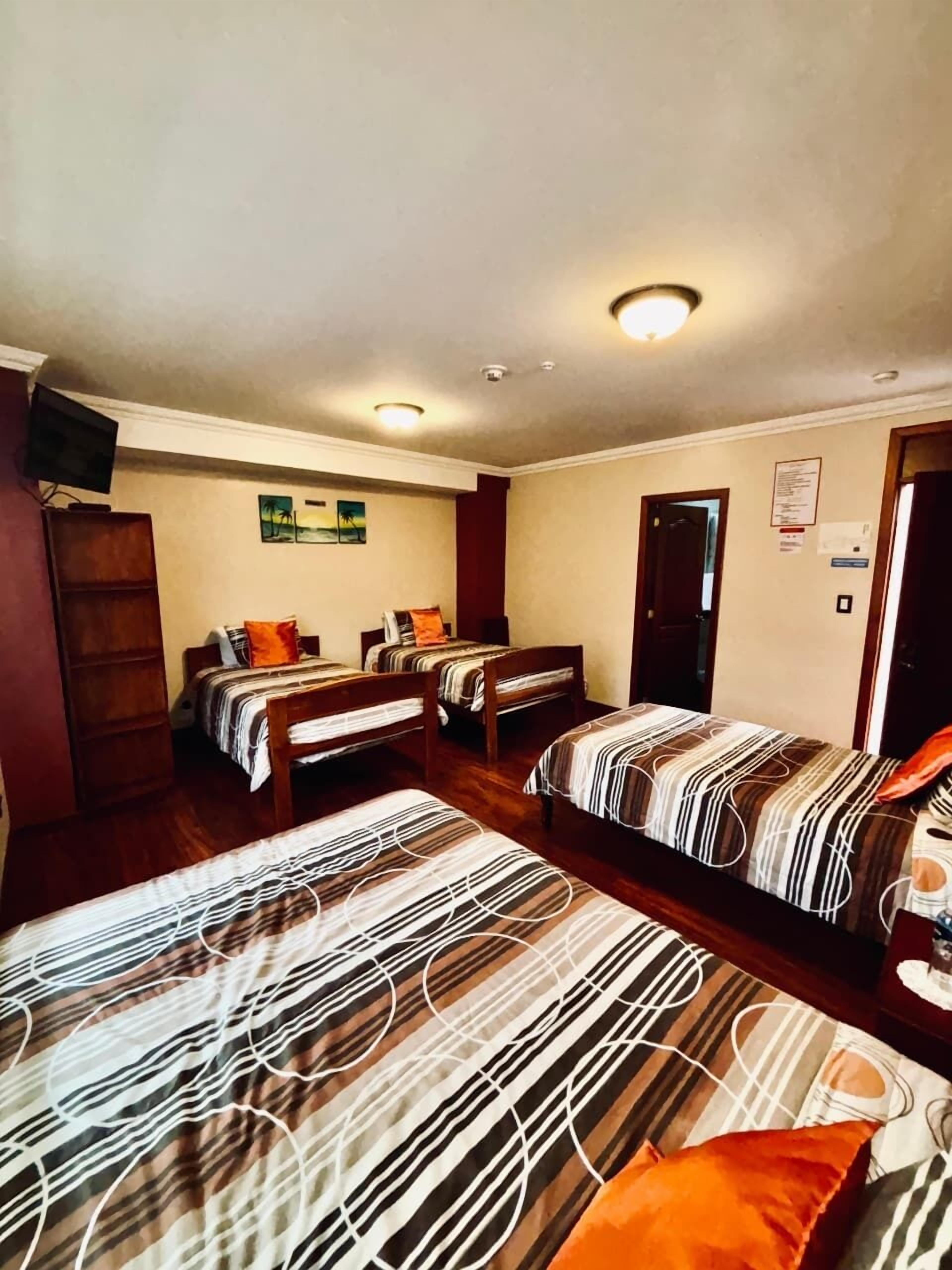 Standard Quadruple Room, Patio, Courtyard View