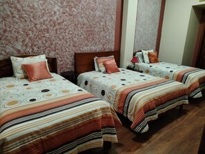 Basic Triple Room, Patio, Garden View | Down comforters, pillowtop beds, individually decorated, free WiFi - Hotel Pegasus (Cuenca)