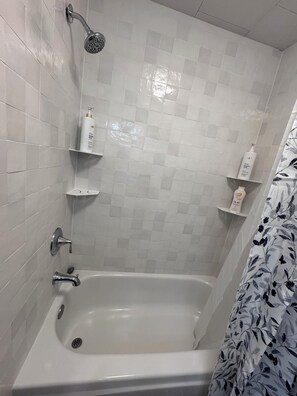 Hair dryer, towels, soap, shampoo