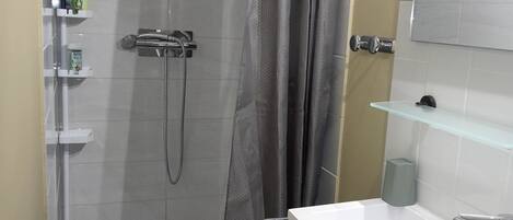 Hair dryer, towels, soap, toilet paper