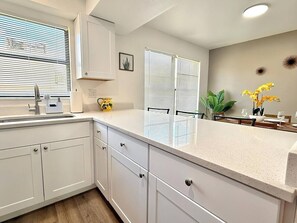 Private kitchen - Modern Coral Gem: Patio | Work Space | Downtown (Cape Coral)