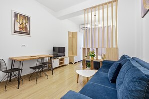 Apartamento Confort, balcón | Zona de estar